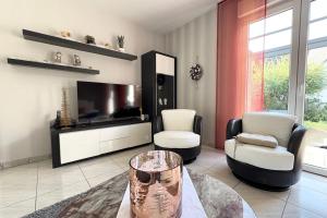 Μια τηλεόραση ή/και κέντρο ψυχαγωγίας στο La Houblonnière charme et confort alsacien