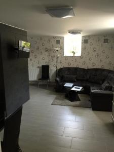 TV o dispositivi per l'intrattenimento presso Varkerulet Apartman