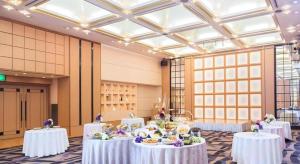 a room with white tables with flowers on them at Nagoya Sakae Tokyu REI Hotel in Nagoya +120 photos