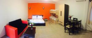 Postel nebo postele na pokoji v ubytování Godija Hotel & Suites