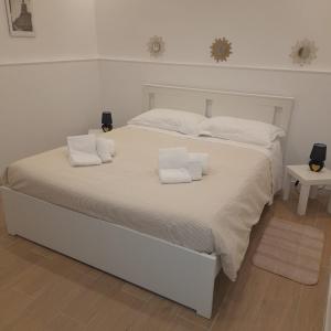 Un pat sau paturi într-o cameră la Mia's Home