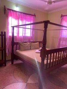 Ένα ή περισσότερα κρεβάτια σε δωμάτιο στο Zazu Beach House