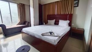 Postel nebo postele na pokoji v ubytování Hotel O Chinar Park Formerly Zapper Inn