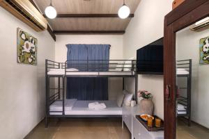 Ảnh trong thư viện ảnh của SaffronStays Bay Watch - 3BR beachfront pool villa with bonfire, gazebo & coconut grove lawns along Kelwa shoreline ở Māhīm