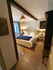 Postel nebo postele na pokoji v ubytování La maison du lac