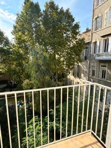 a white fence in front of a yard at l espérandieu in Marseille