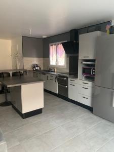 Η κουζίνα ή μικρή κουζίνα στο Cosy Lodge