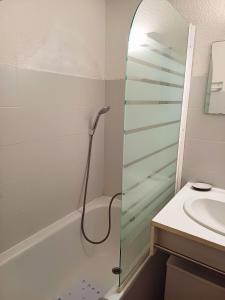 a bathroom with a shower and a sink at Col de Rousset - App. 2 P in Rousset