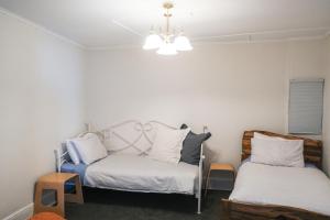 Ένα ή περισσότερα κρεβάτια σε δωμάτιο στο 128 Murray - Sassafras