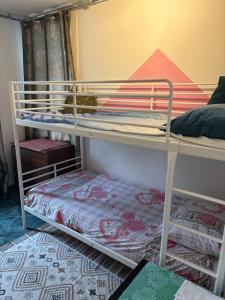 Ένα ή περισσότερα κρεβάτια σε δωμάτιο στο B&B Calypso Amsterdam
