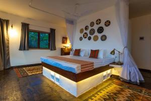 Postel nebo postele na pokoji v ubytování PUMZIKA-TU Shimba hills , Diani + 21 fotografií