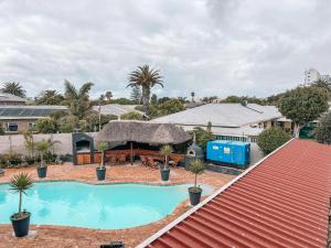 Bazén v ubytování Ilanga Du Cap Hotel nebo v jeho okolí