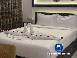 Postel nebo postele na pokoji v ubytování Le Park Resort