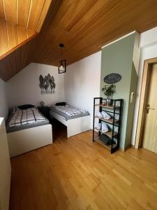 Ένα ή περισσότερα κρεβάτια σε δωμάτιο στο Ferienhaus Silke