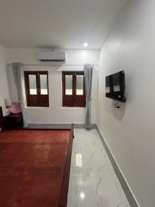 Televisyen dan/atau pusat hiburan di Myluangprabangguesthoues