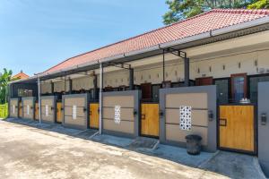 a row of lock up doors in a building at TwoSpaces Living at Bunda Nana Residence, Gianyar in Gianyar