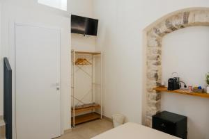 Μια τηλεόραση ή/και κέντρο ψυχαγωγίας στο Rihal Rooms