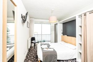 Postel nebo postele na pokoji v ubytování Villages Clubs du Soleil - ORCIERES