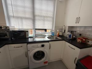 Η κουζίνα ή μικρή κουζίνα στο Tonbridge House