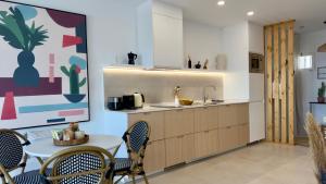 Køkken eller tekøkken på El Oasis de NaLi - Playa Grande