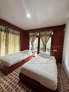 Ένα ή περισσότερα κρεβάτια σε δωμάτιο στο Sunrise Brunch & Stay