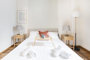 Giường trong phòng chung tại Easylife - Milano - Mazzini 20 - Duomo