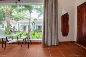 Κήπος έξω από το Emma Bungalow