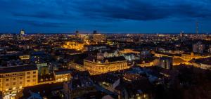 a view of a city at night at Flexible SelfCheckIns 13 & 14 - Le Petit & Le Grand Zagreb - Centre - New - Apartments Repinc in Zagreb +34 photos