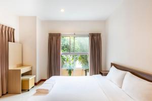 Postel nebo postele na pokoji v ubytování Teja Hotel + 53 fotografií