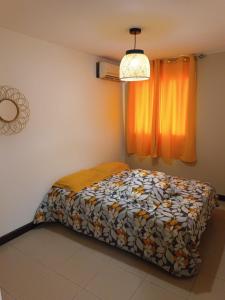 Ένα ή περισσότερα κρεβάτια σε δωμάτιο στο KDS appartement T2 Île de la Réunion