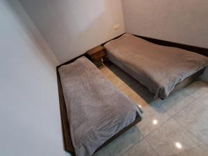 a room with two beds in a room at Hostel Dilijan in Dilijan