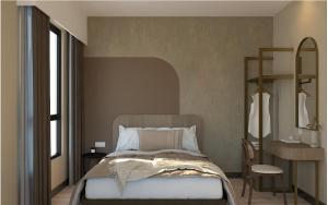 a bedroom with a bed and a table and a chair at Kivana Suite, Vetro 11 by Ayuhouz in Kota Kinabalu