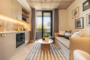 Posezení v ubytování ONE46 on M - Fluent Serviced Apartments