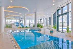Swimmingpoolen hos eller tæt på APT Nadmorskie - Polanki AQUA