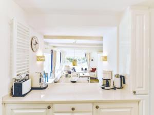 Příslušenství pro přípravu čaje a kávy v ubytování Wattgarten von Appartements & Mehr + 7 fotografií