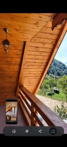 a view from the inside of a wooden roof at Cabana La Iura in Bistra