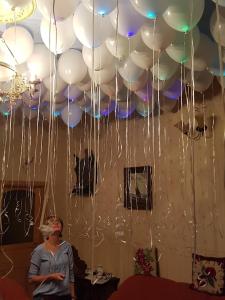 a man standing in front of a bunch of balloons at Palac Kursko Agroturystik in Kursko +9 photos