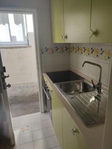 Kuchyň nebo kuchyňský kout v ubytování La Flavia