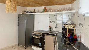 Kuchyň nebo kuchyňský kout v ubytování Adar surf house + 26 fotografií