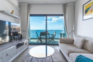 TV a/nebo společenská místnost v ubytování Belle Vue Résidence by Atlantic Holiday