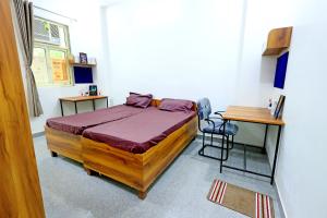 Ένα ή περισσότερα κρεβάτια σε δωμάτιο στο FlexiBay-Girls Hostel North Delhi +34 φωτογραφίες