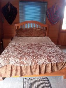 Ένα ή περισσότερα κρεβάτια σε δωμάτιο στο Homestay Alina