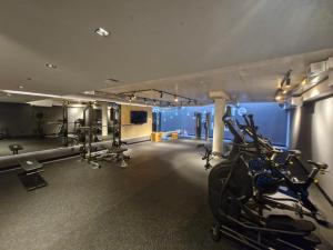 a gym with a bunch of bikes in a room at Al lado de la playa, restaurantes y el WTC in Montevideo