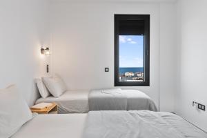 Ένα ή περισσότερα κρεβάτια σε δωμάτιο στο Villa Aurea, Piscina privada, Solárium, Vistas