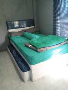 Ένα ή περισσότερα κρεβάτια σε δωμάτιο στο Homestay Alina