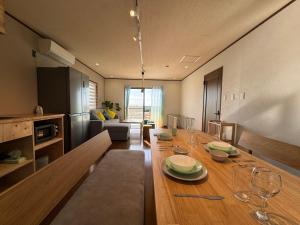 Χώρος καθιστικού στο Aoniwa Awaji - Sea, Sky, Swing