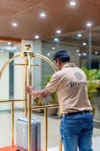 Επισκέπτες που μένουν στο Pravasa Stay, Bapat Square