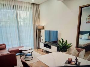 Телевизор и/или развлекательный центр в The Blisss Parkview Central