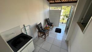 TV a/nebo společenská místnost v ubytování Casa Dona Vera - Seu Refúgio no Centro Histórico