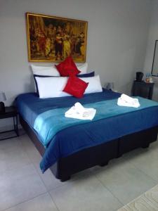 Ένα ή περισσότερα κρεβάτια σε δωμάτιο στο Columbae Guesthouse